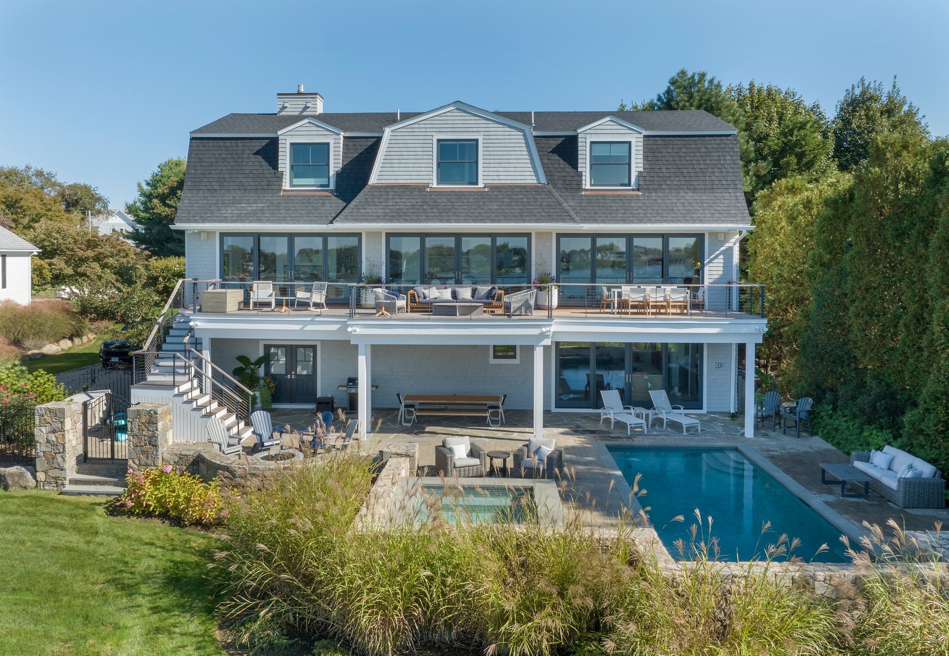 Rhode Island Residence — aerial rear elevation with deck and pool over the cove