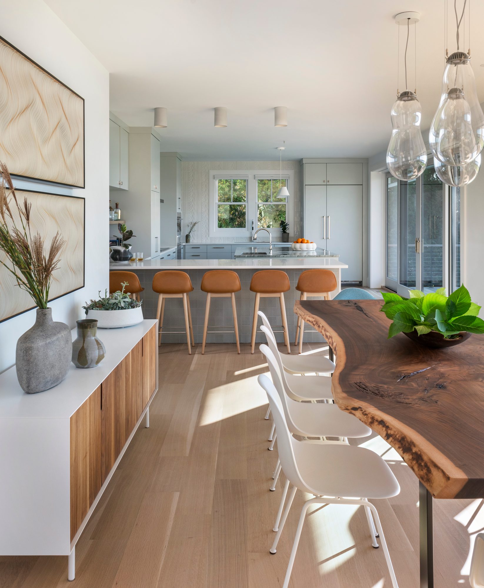 Rhode Island Residence — live-edge dining table into the coastal kitchen