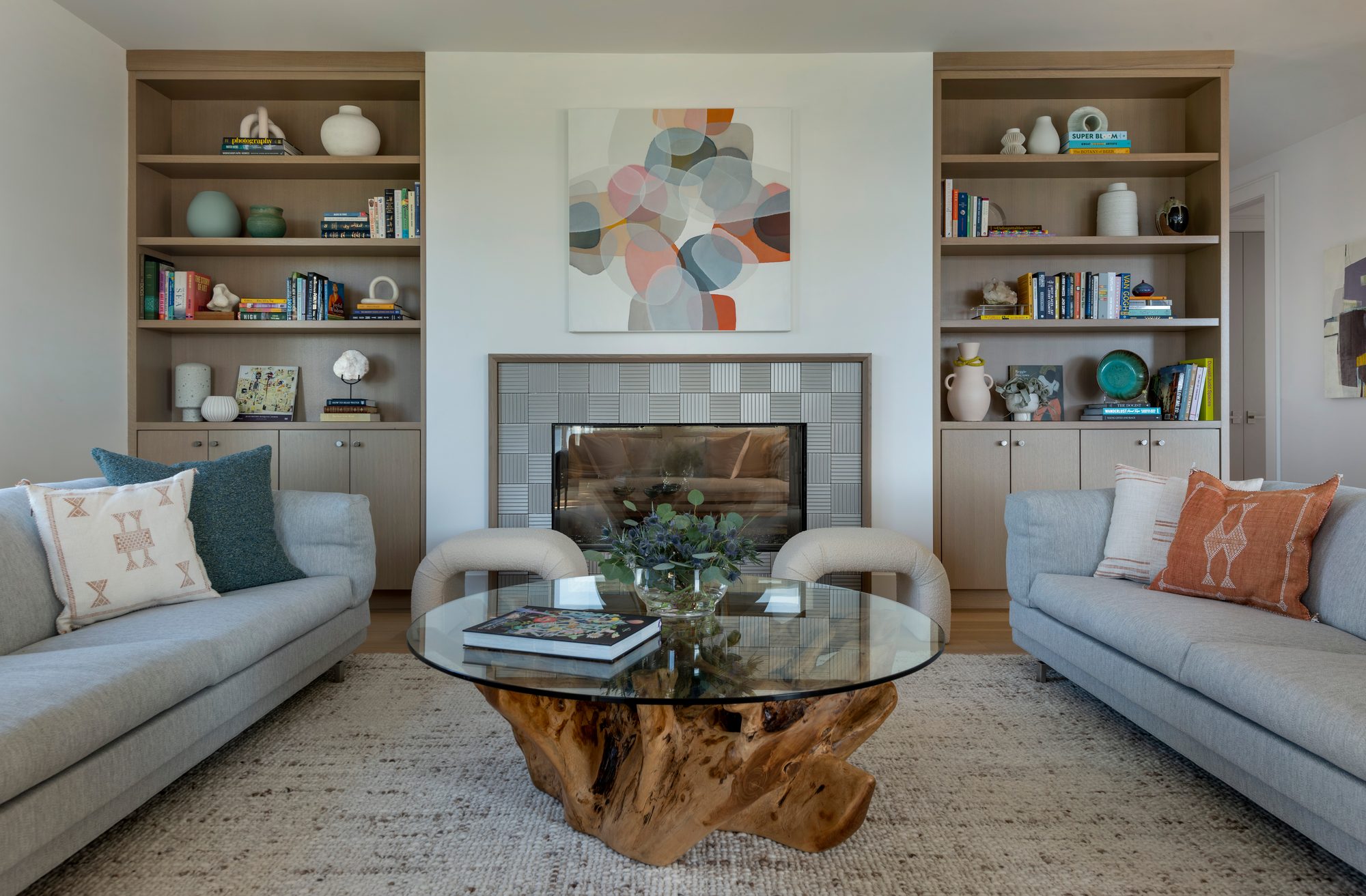 Rhode Island Residence — living room with built-in bookcases and tiled fireplace