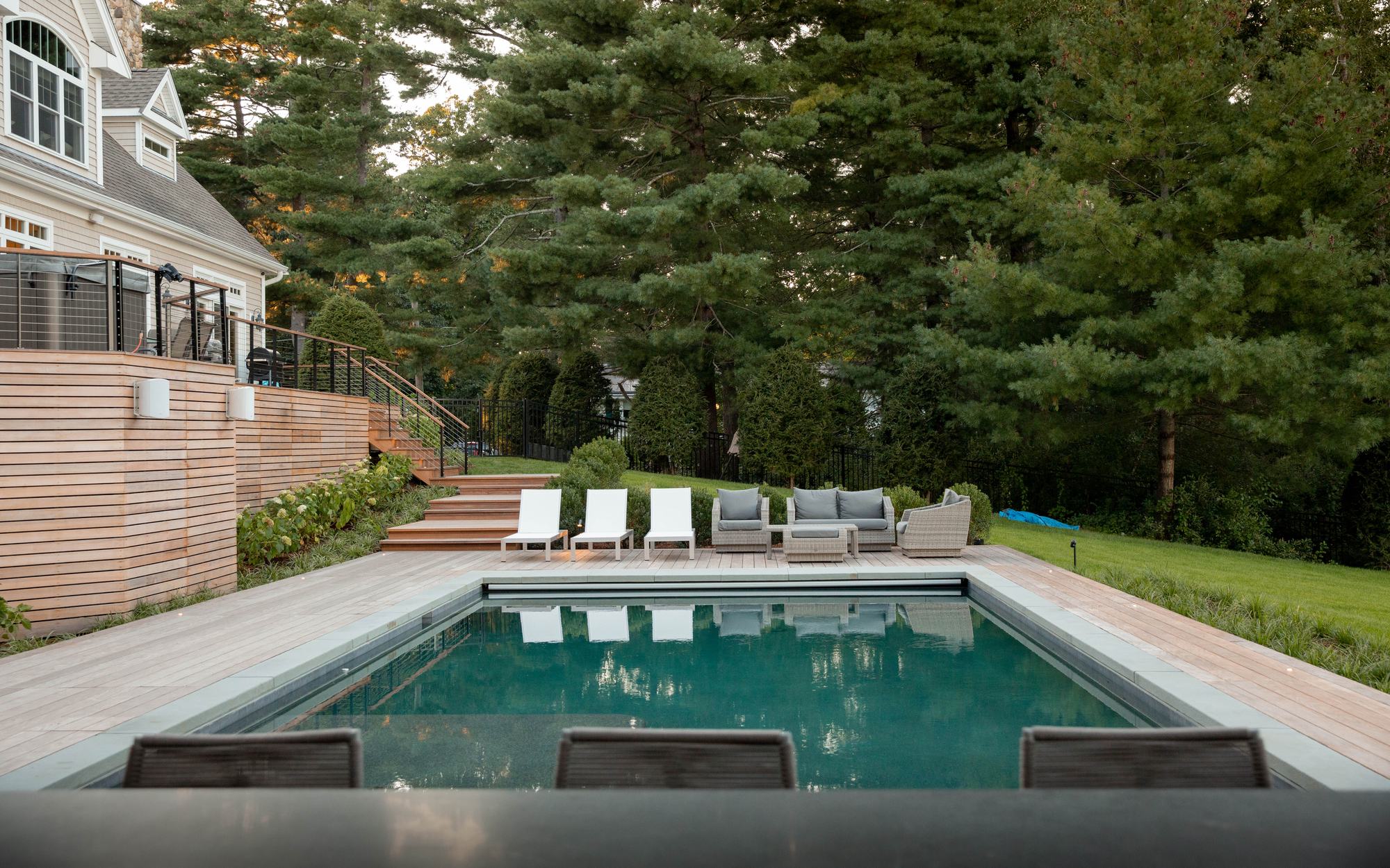 Sharon Landscape — pool and lounge area with the home at blue hour