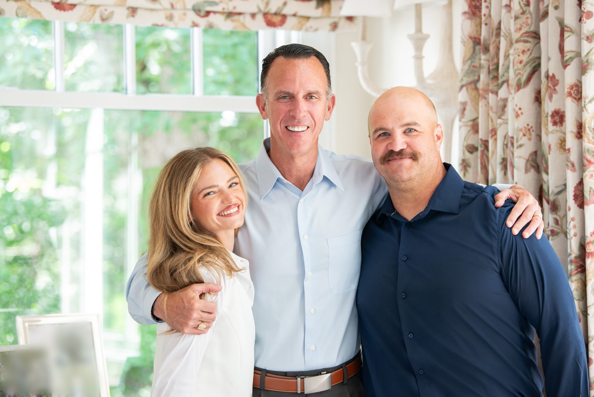 The RTHarris team — Kayla Harris, owner Rick Harris, and Richard Catenacci