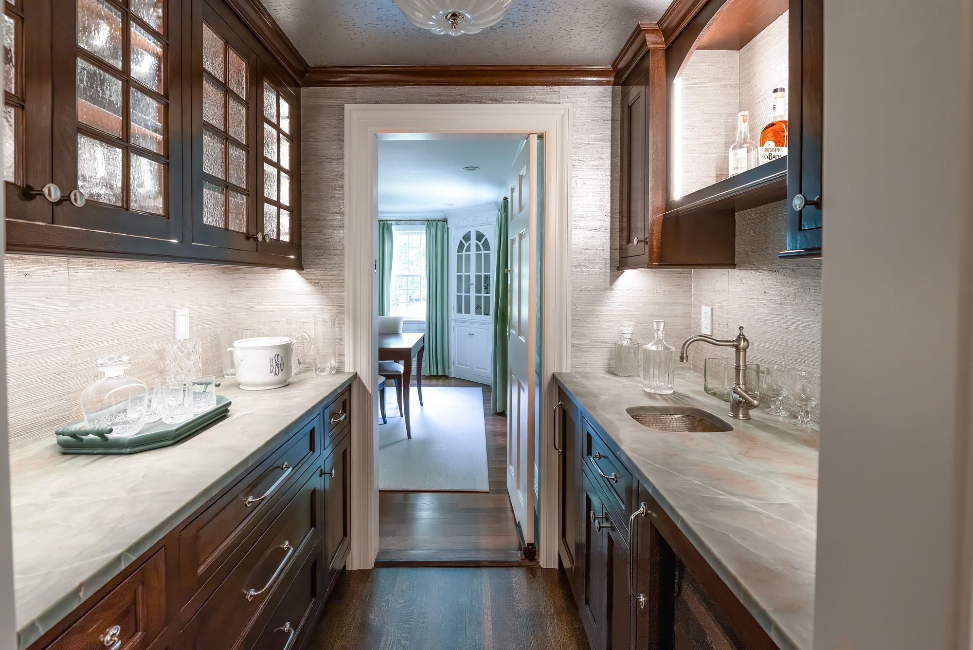 Wellesley Renovation — custom butler's pantry and wet bar with glass-front cabinetry