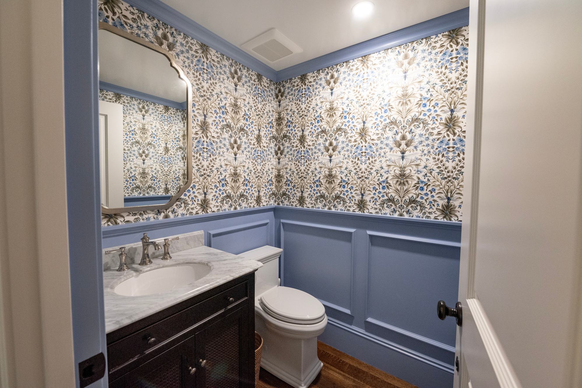 Wellesley Renovation — wet bar galley opening to the powder room