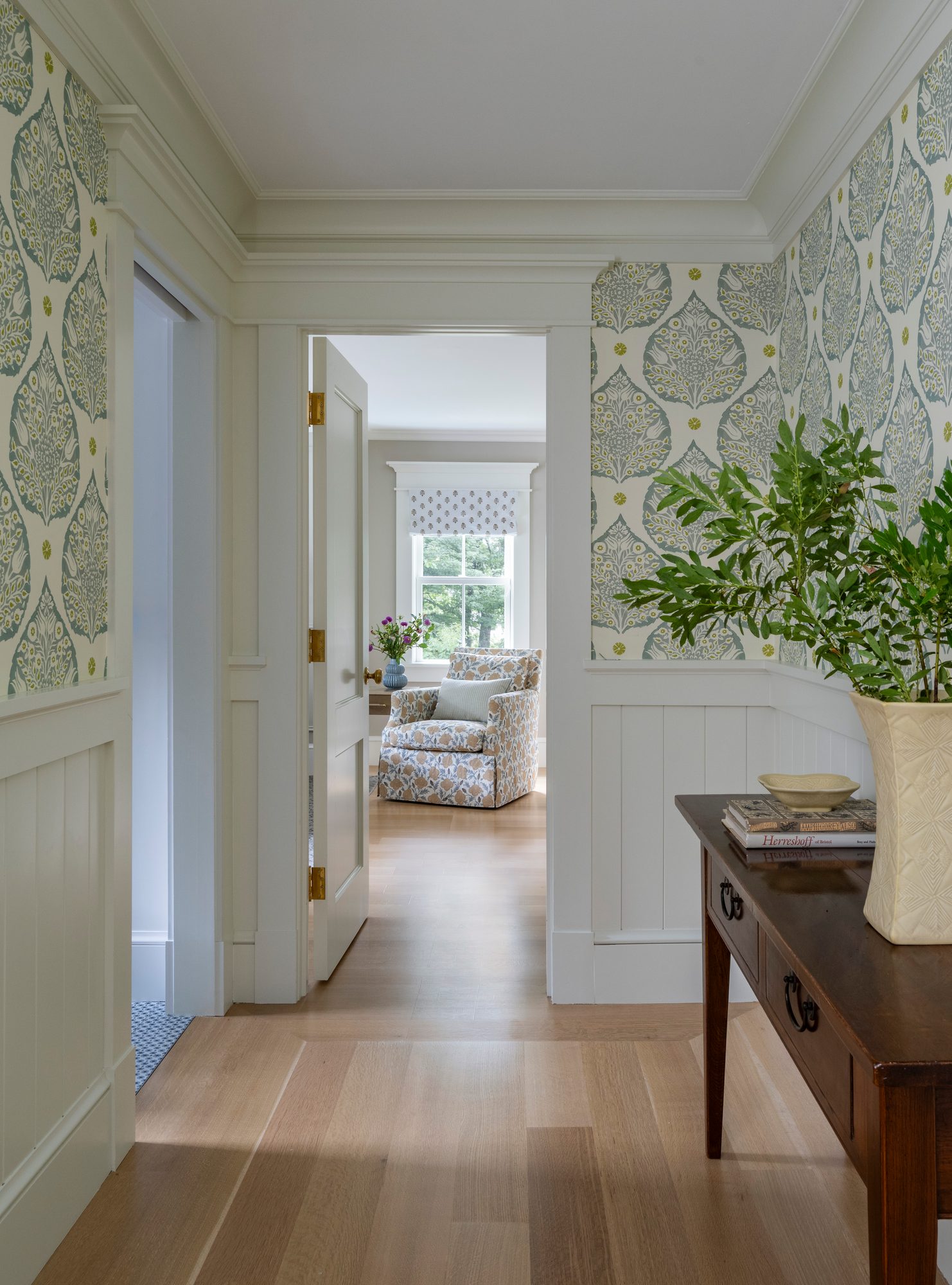Westport Residence — upstairs hall with patterned wallpaper looking through to a bedroom