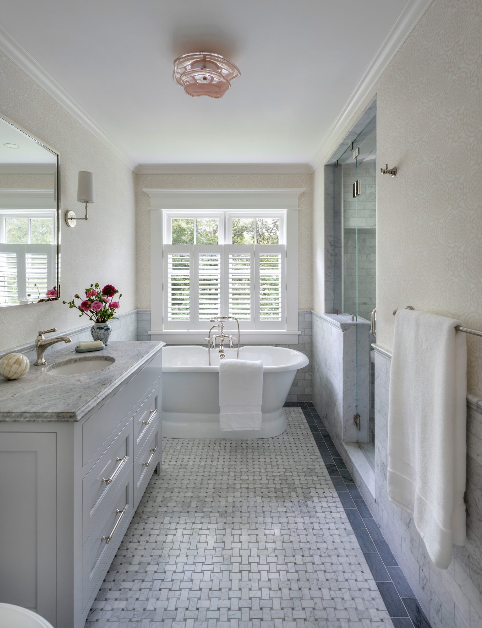 Westport Residence — primary bath with a freestanding tub and marble tile